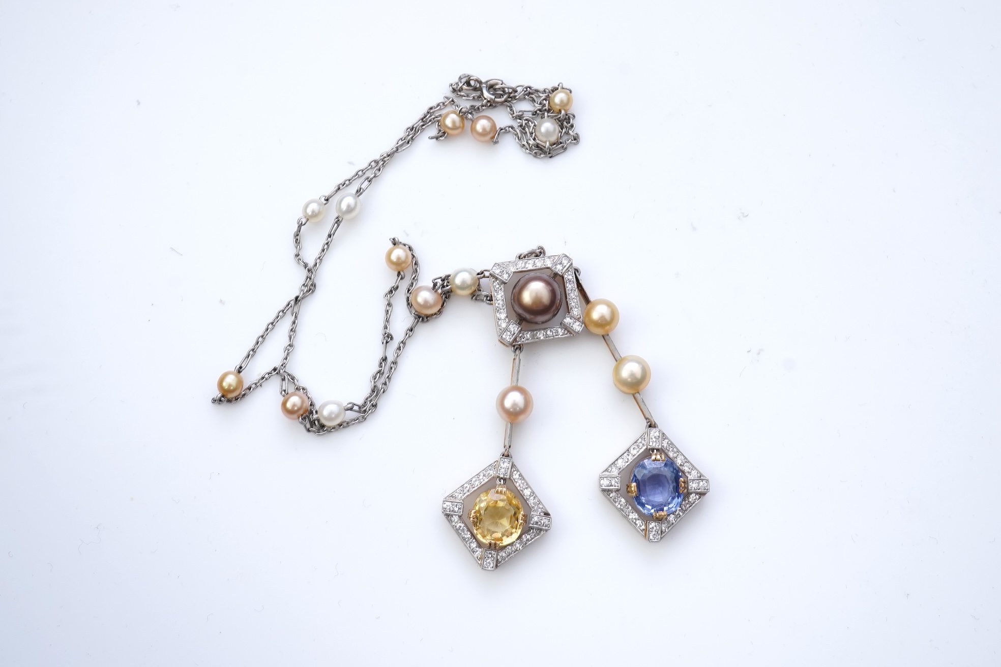 An Art Deco sapphire, natural pearl and diamond necklace, circa 1920